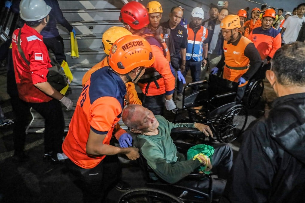 Survivors of a ferry fire arrive at Tanjung Perak Port in Surabaya, East Java, Indonesia on Monday. Photo: EPA