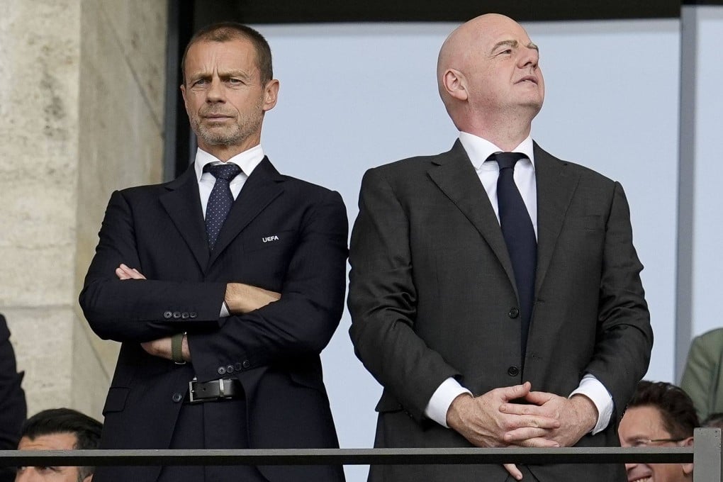 Uefa, headed by Aleksander Ceferin (left), has threatened legal action over Fifa counterpart Gianni Infantino's controversial World Cup plan. Photo: Photo: dpa