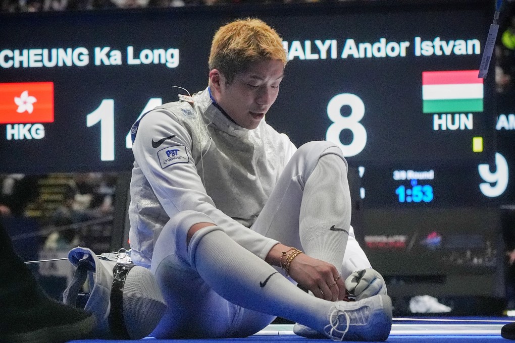 Hong Kong’s Cheung Ka-long takes a moment during a men’s team foil contest against Hungary at the Kerry Fencing World Championships. Photo: Elson Li