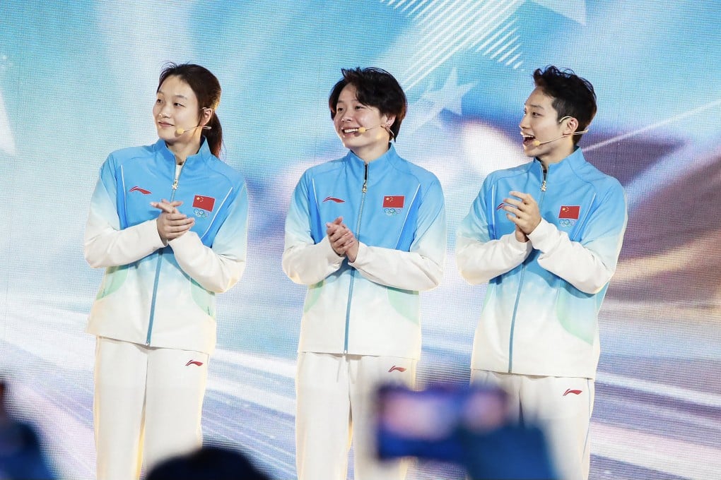 China's new victory ceremony uniforms, worn by divers (from left) Chen Jia, Chen Yiwen and Wang Zongyuan, feature a blue palette and linear star patterns. Photo: Facebook/CGTN Sports Centre