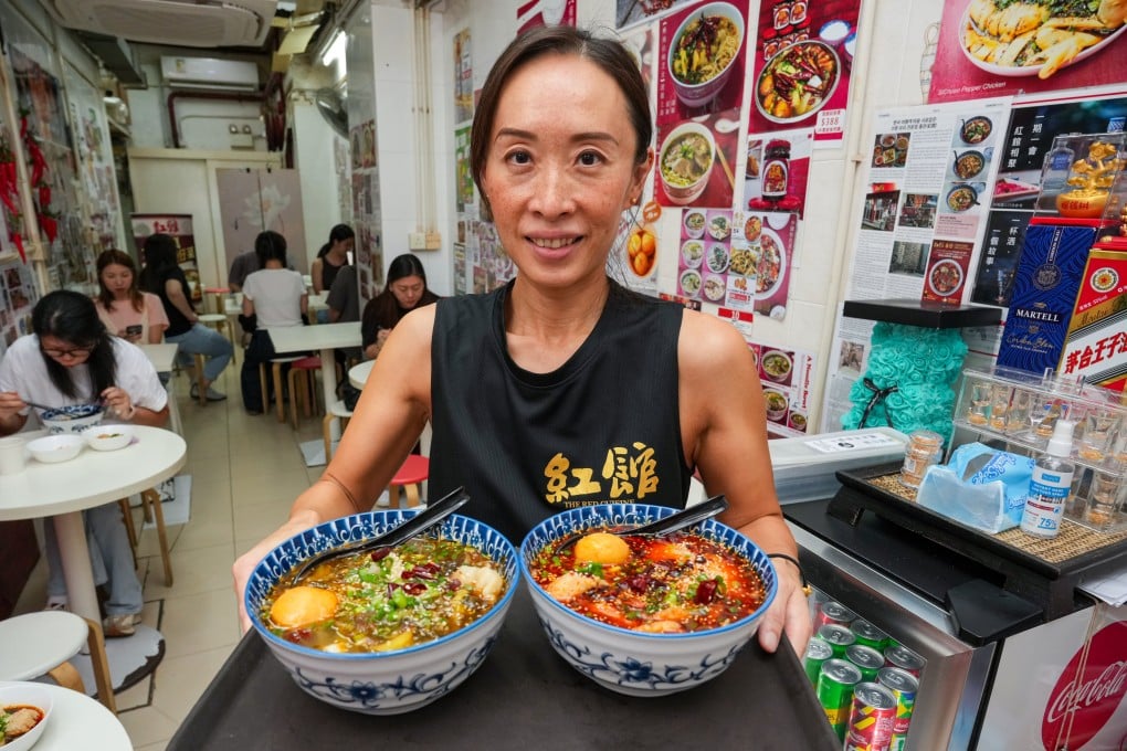 The Red Cuisine owner Joyce Yuen serves dishes at her restaurant in Quarry Bay, Hong Kong. Many restaurants in the city are struggling with falling customer numbers as more locals head to Shenzhen for cheaper meals. Photo: May Tse