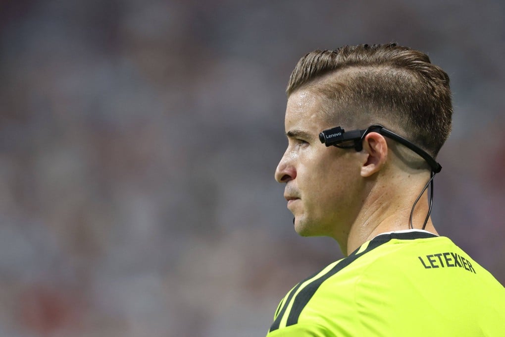 Lenovo built cameras that were not only really small so they could be easily worn by officials such as French referee Francois Letexier, but that also had long battery life. Photo: AFP