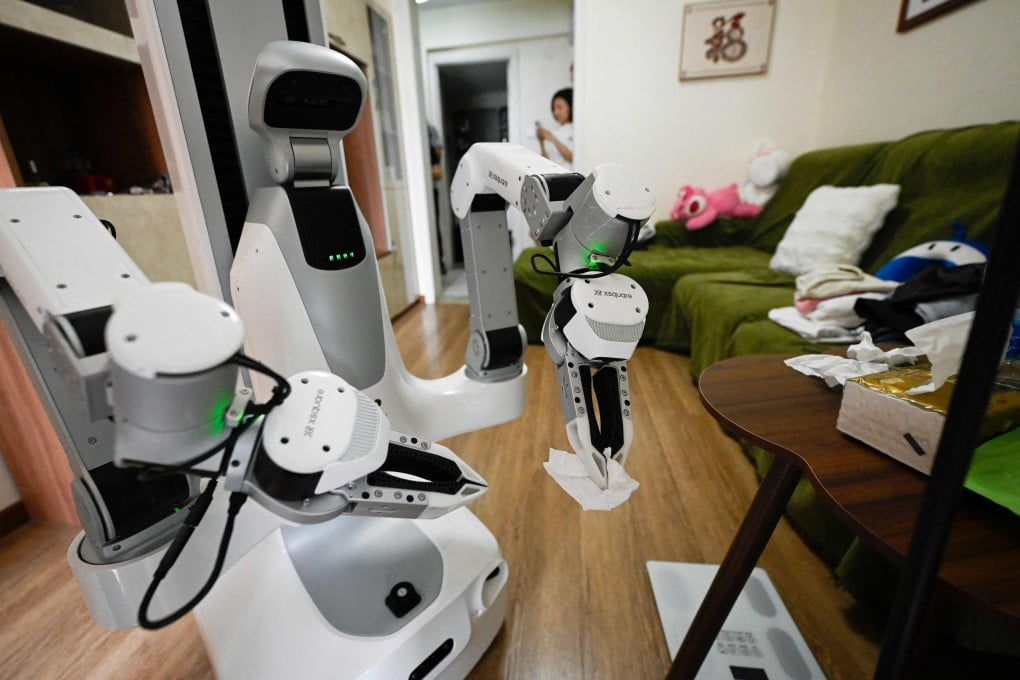 An X Square Robot cleaning a home in Beijing on May 21. Photo: AFP