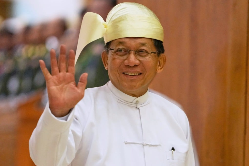 Myanmar President Min Aung Hlaing leaves after delivering a speech in parliament on Friday. Photo: AP