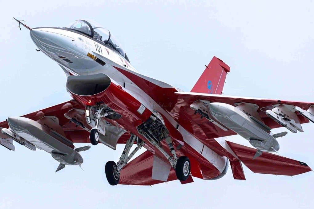 A Mitsubishi F-2B fighter jet was spotted carrying two inert air-launched Type 12 anti-ship missiles under its wings during a flight test at Gifu airbase in central Japan on July 30. Photo: Handout