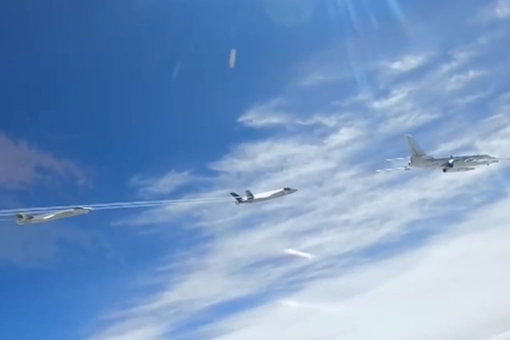 Two PLA J-20 stealth fighters escort an H-6N bomber which appears to be armed with a JL-1 nuclear-capable air-launched ballistic missile. Photo: CCTV