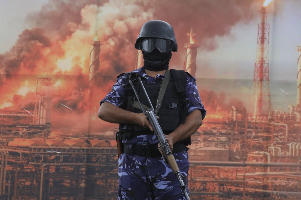 A Houthi trooper stands guard during a protest against Saudi Arabia in Sanaa, Yemen, on Friday. Yemeni officials blamed Tuesday’s ship attack on the Iran-backed militants. Photo: EPA