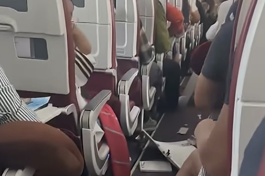 Passengers on board Air India ⁠flight AI2379 that experienced a sudden loss in altitude on Tuesday. Photo: YouTube