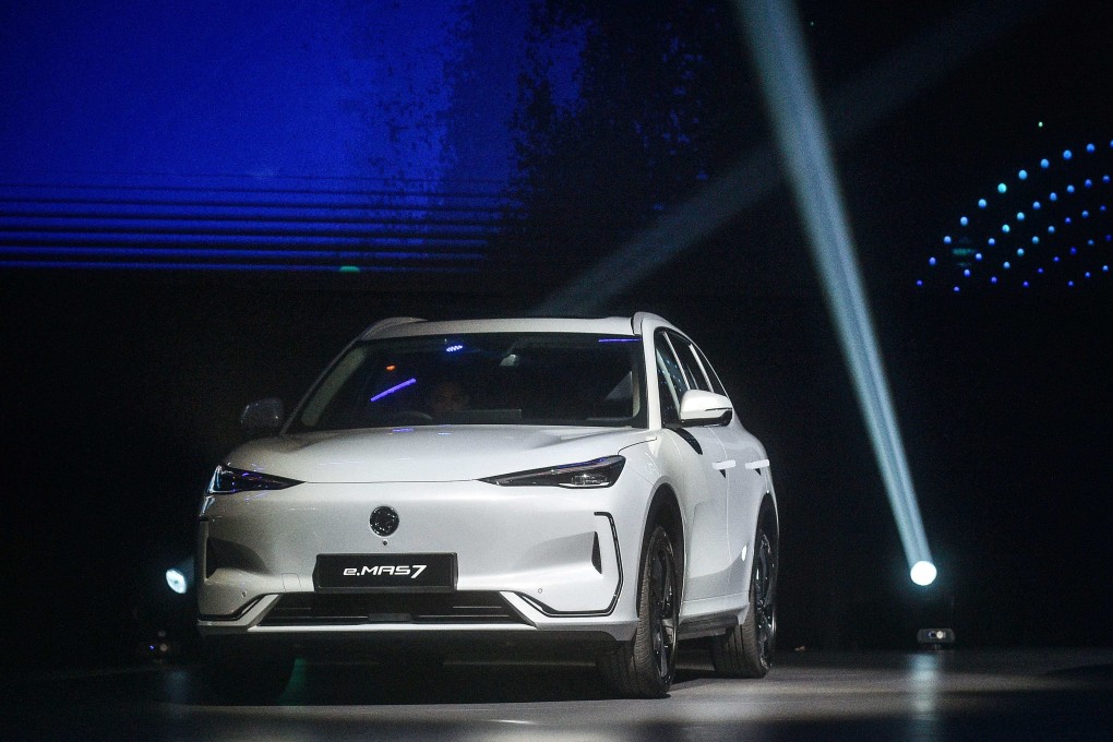 Malaysia’s first locally produced electric vehicle, the e.MAS 7, is seen during its launch event at Malaysia International Trade and Exhibition Centre in Kuala Lumpur in December 2024. Photo: AFP