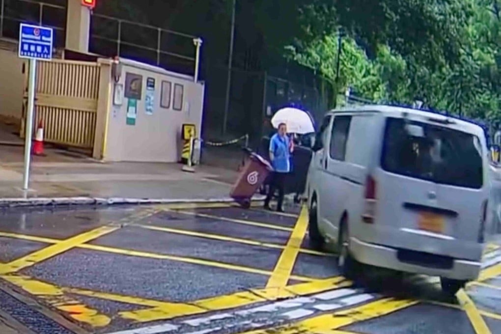A 37-year-old van driver has been arrested after a viral video showed him swerving dangerously close to a woman on the side of the road in Wong Tai Sin. Photo: Handout