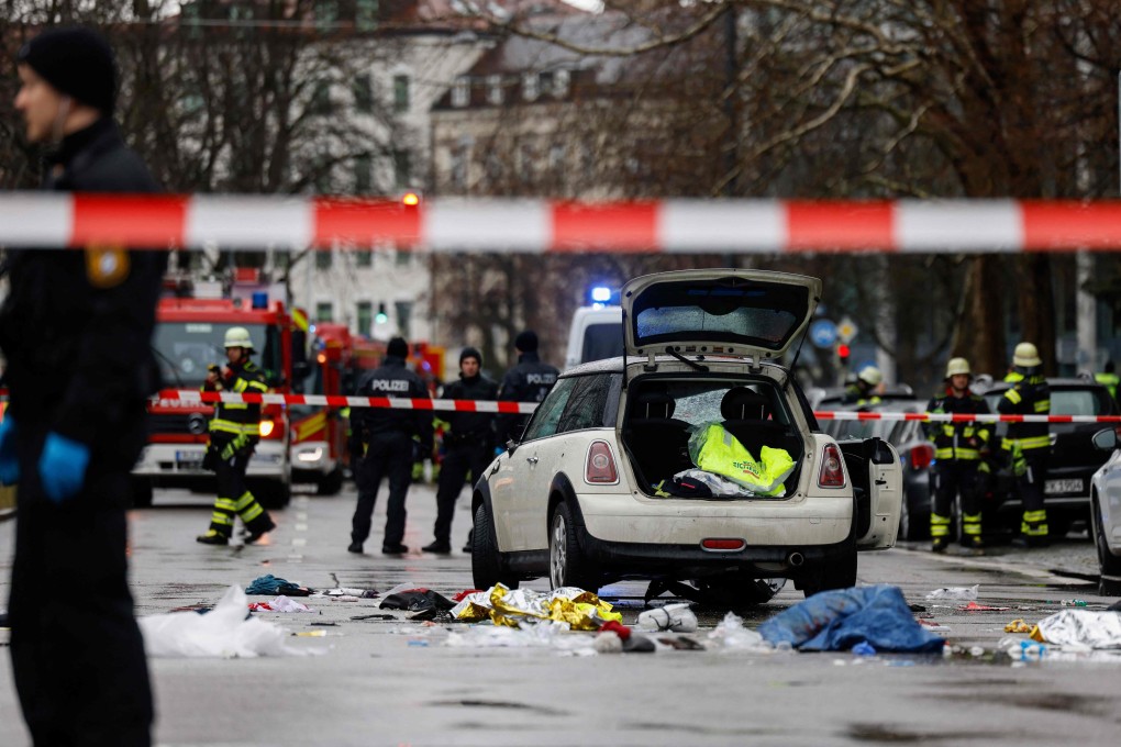 Members of the emergency services work at the scene where a car drove into a crowd in the southern German city of Munich on February 13, 2025 leaving several people injured, police said. Photo: AFP