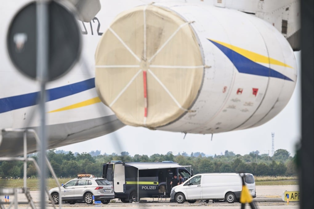 Police forensic technicians work near a Ukrainian aircraft at Leipzig-Halle Airport in Schkeuditz, Germany, on Wednesday. Photo: dpa via AP