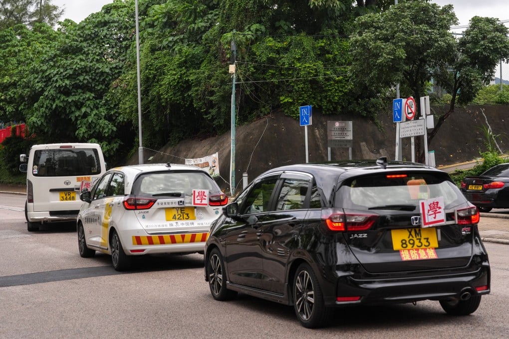 Driving lessons are in progress in Kowloon City learners have their on-road driving lessons with tutors at Tin Kwong Road, Kowloon City. The Transport Department announced in April that applications would open in May for 332 new licences for private driving instructors. 13JUN26 SCMP / Elson Li