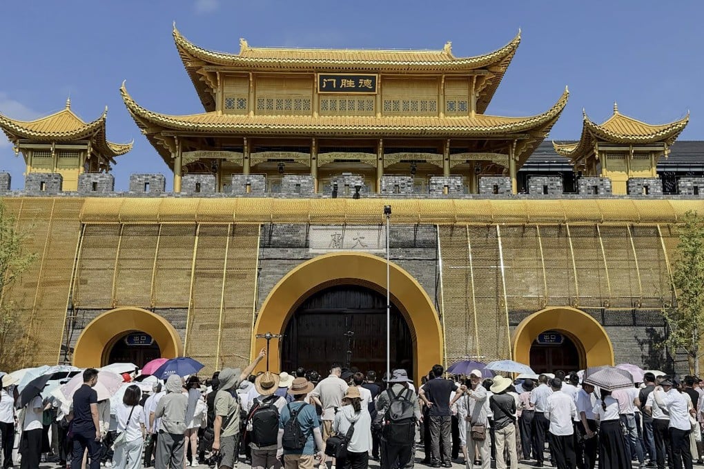 People await entry into Dayong Ancient City during its reopening last month. Photo: Handout