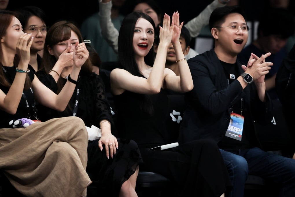 Asian University Basketball League CEO Jay Li Jintian (right) watching a match at Binjiang Gymnasium this week. Photo: Handout