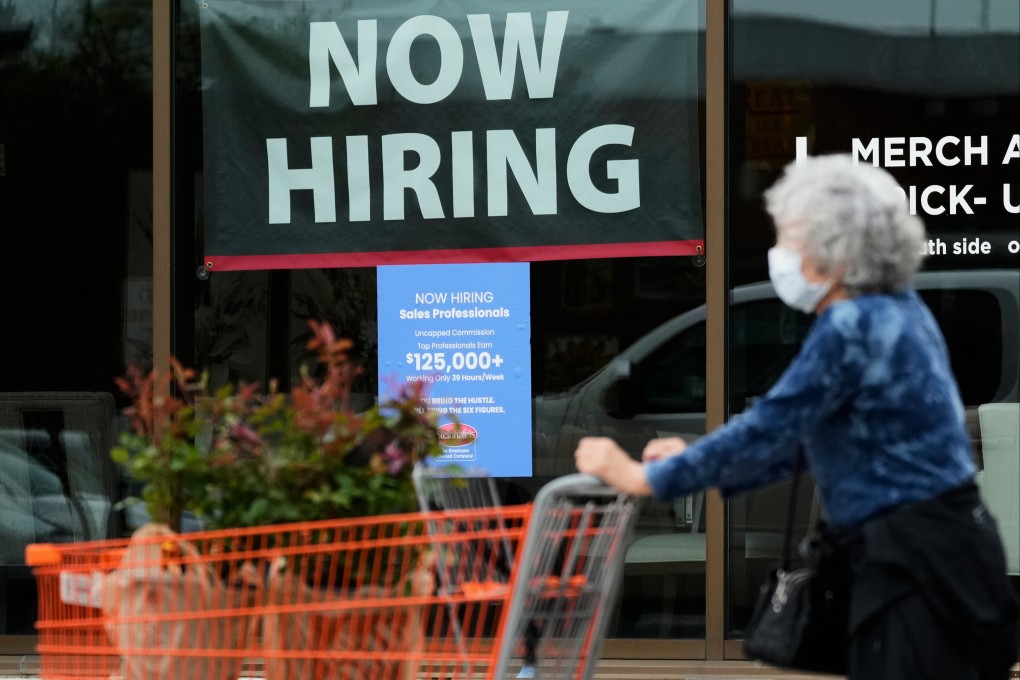 A hiring sign for sales professionals is displayed at a store, in Vernon Hills, Illinois state in the US in April. Photo: AP