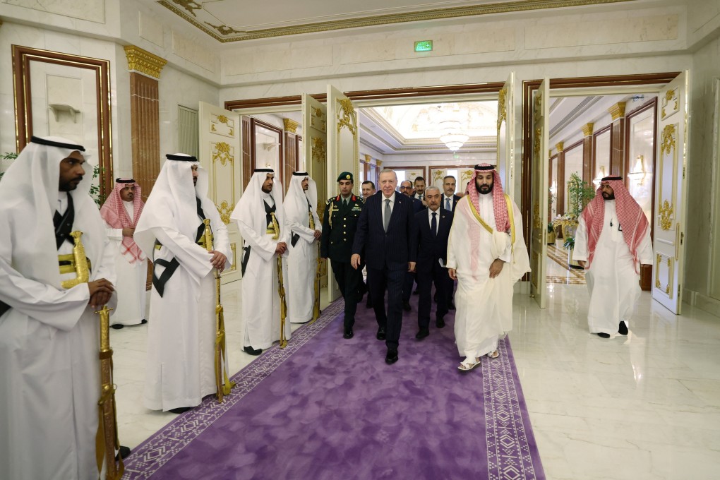 Turkish President Tayyip Erdogan is welcomed by Saudi Crown Prince Mohammed bin Salman, ahead of the signing of a defence deal between Saudi Arabia, Pakistan and Turkey, in Mecca, Saudi Arabia, on Friday. Photo: Turkish Presidential Press Office/Handout via Reuters