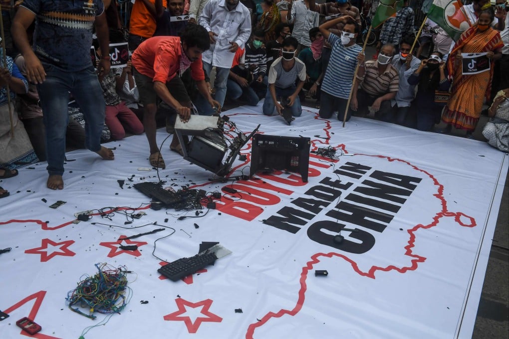 Protesters destroy Chinese goods in Kolkata, India, on June 18, 2020, soon after the countries' militaries clashed on their border. Photo: AFP