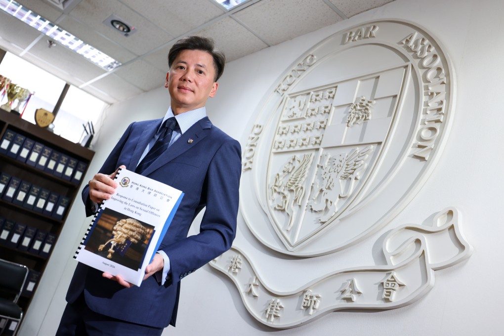 Martin Hui holds a copy of the Bar Association’s submission for the consultation on sexual offence reforms. Photo: Nora Tam