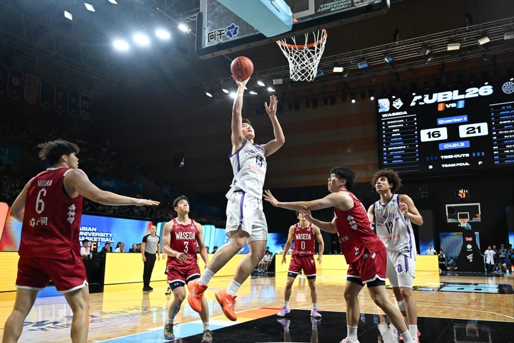 Xu Xitong of Tsinghua University drives to the basket during an Asian University Basketball League game against Waseda University. Photo: Getty Images