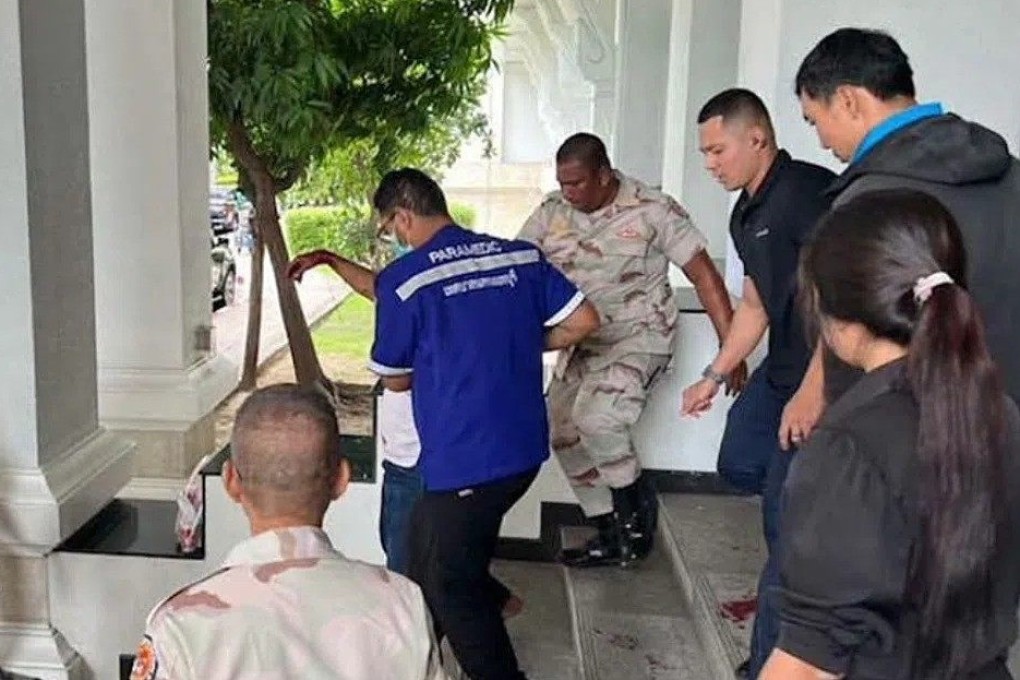 A suspected gunman is caught after opening fire in a Thai government office. Photo: X/aoikotori