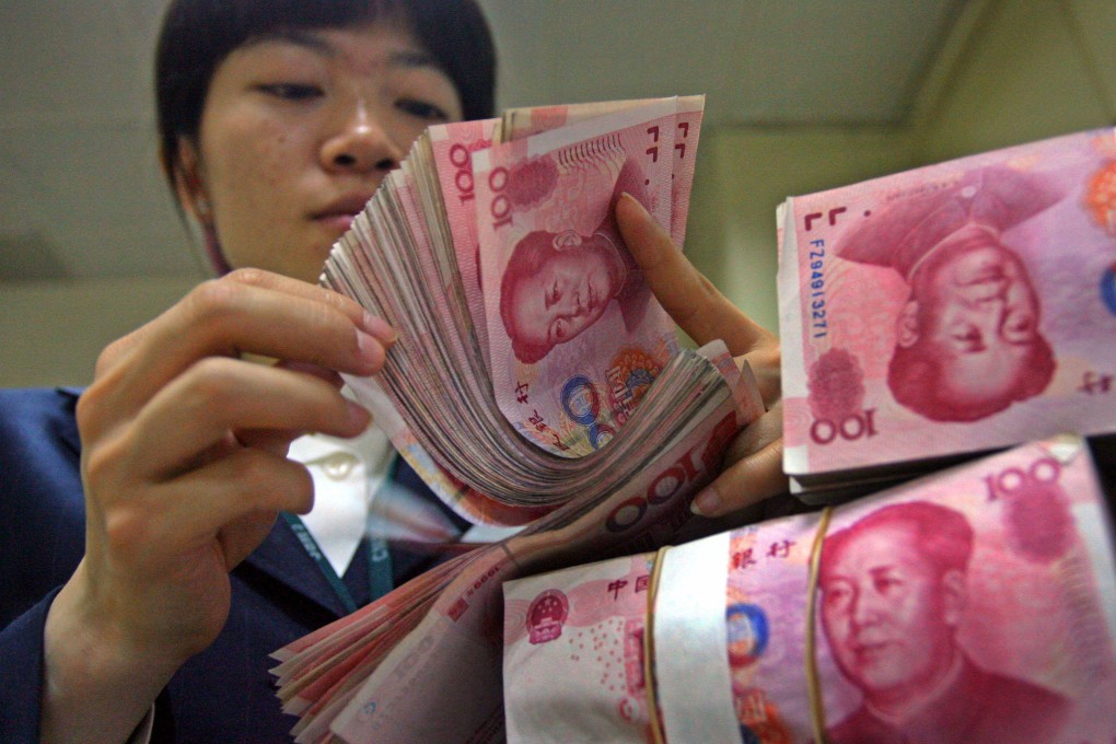Yuan notes are counted at a bank in China’s Jiangsu province. According to a Goldman Sachs analyst, “the current bond-issuance boom is a historic opportunity”. Photo: Reuters