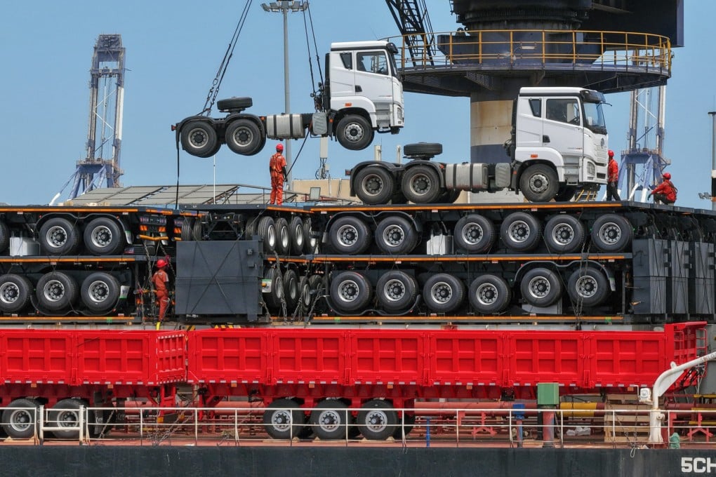Vehicles being loaded onto a ship at Yantai Port in east China’s Shandong province on July 15. China’s gross domestic product grew 4.3 per cent in the second quarter, lagging the government’s growth target of 4.5 to 5 per cent for the year. Photo: Xinhua