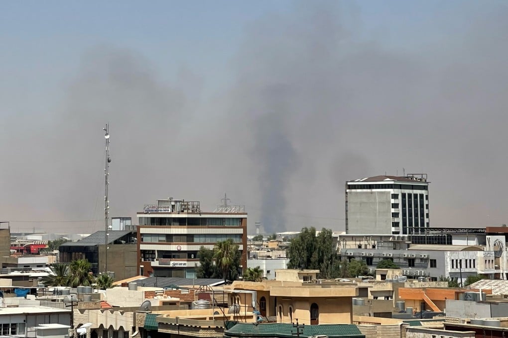 Black smoke rises following explosions near a military base hosting US forces in the northern Iraqi city of Irbil in July. Photo: AP