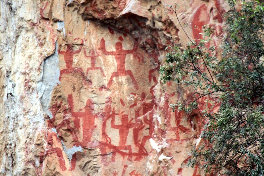 China's ancient rock art, dating back 2,000 years, has endured the test of time thanks to the protective properties of post-partum blood, surviving extreme heat and powerful typhoons. Photo: Wikipedia