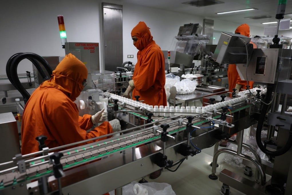 Employees work inside a pharmaceutical company manufacturing unit on the outskirts of Ahmedabad, India, in April 2025. Photo: Reuters