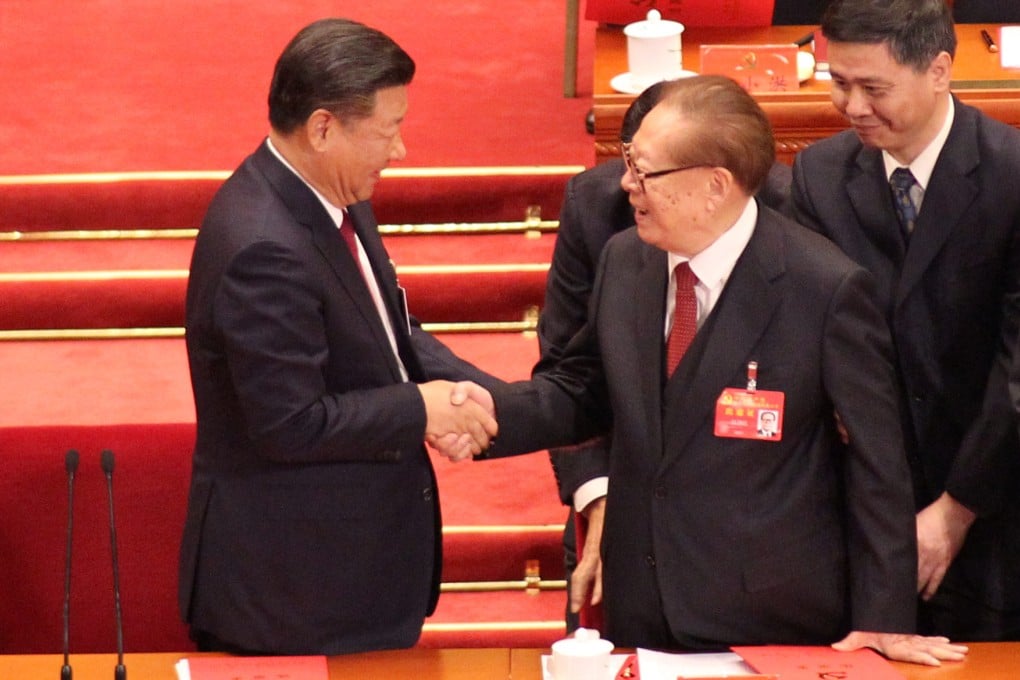 Chinese President Xi Jinping (left) shakes hands with former leader Jiang Zemin at the 19th party congress in 2017. Photo: Simon Song