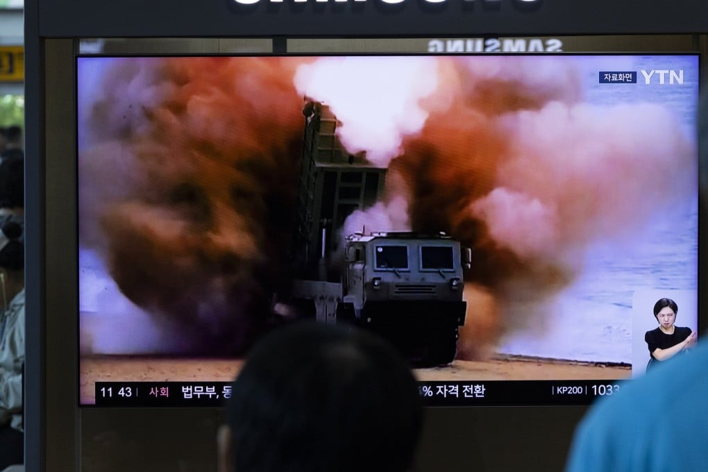 People in Seoul watch a news broadcast about a North Korean missile launch on Wednesday. Photo: EPA