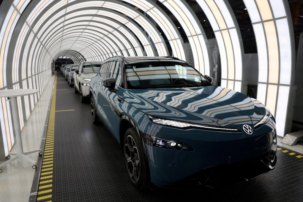 Electric vehicles made by Volkswagen are seen on a production line in China’s Anhui province earlier this year. Photo: Reuters