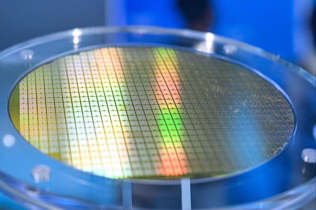 A wafer sample is seen during the World Artificial Intelligence Conference in Shanghai on July 18. China is looking to cultivate an alternative chipmaking ecosystem. Photo: AFP