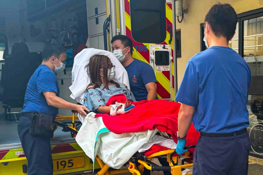 Emergency responders send an injured passenger for treatment. Photo: Handout