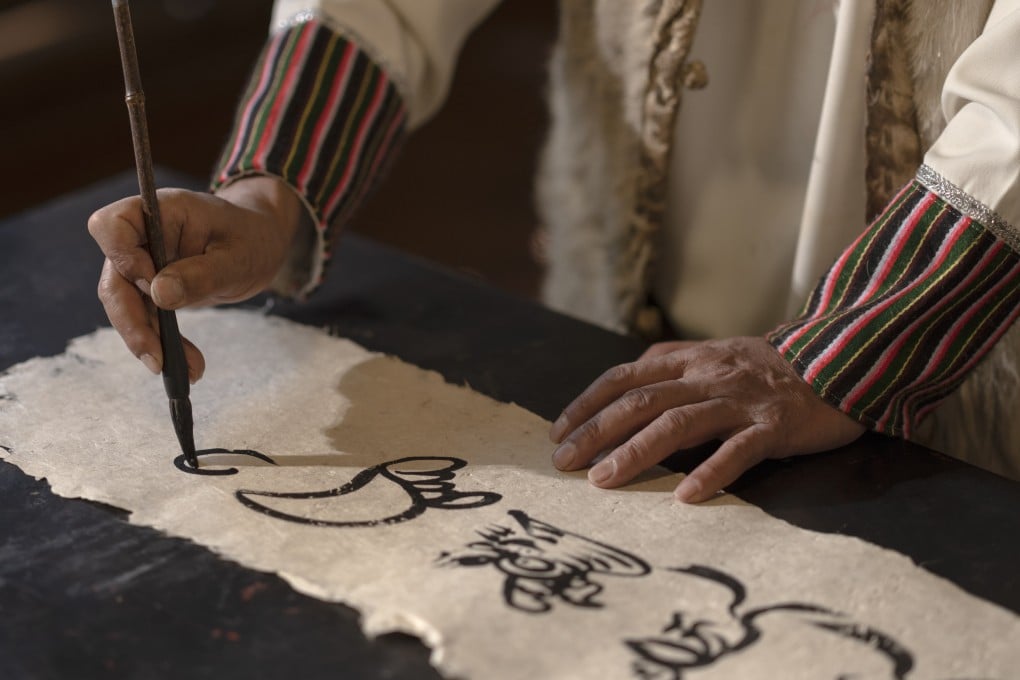 Dongba script, the world’s only hieroglyphic script still in use today, was created by Naxi shamans for sacred rituals. Photo: Amandayan