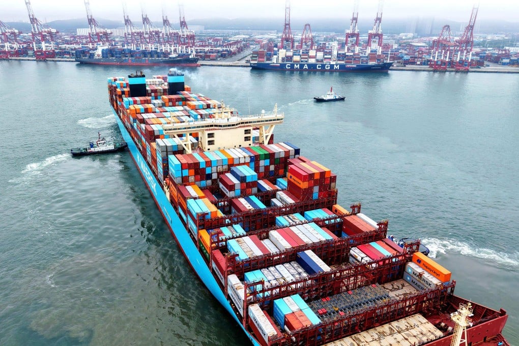 A container ship is moved into position at the port in Qingdao, in China’s eastern Shandong province, on May 26. Photo: AFP