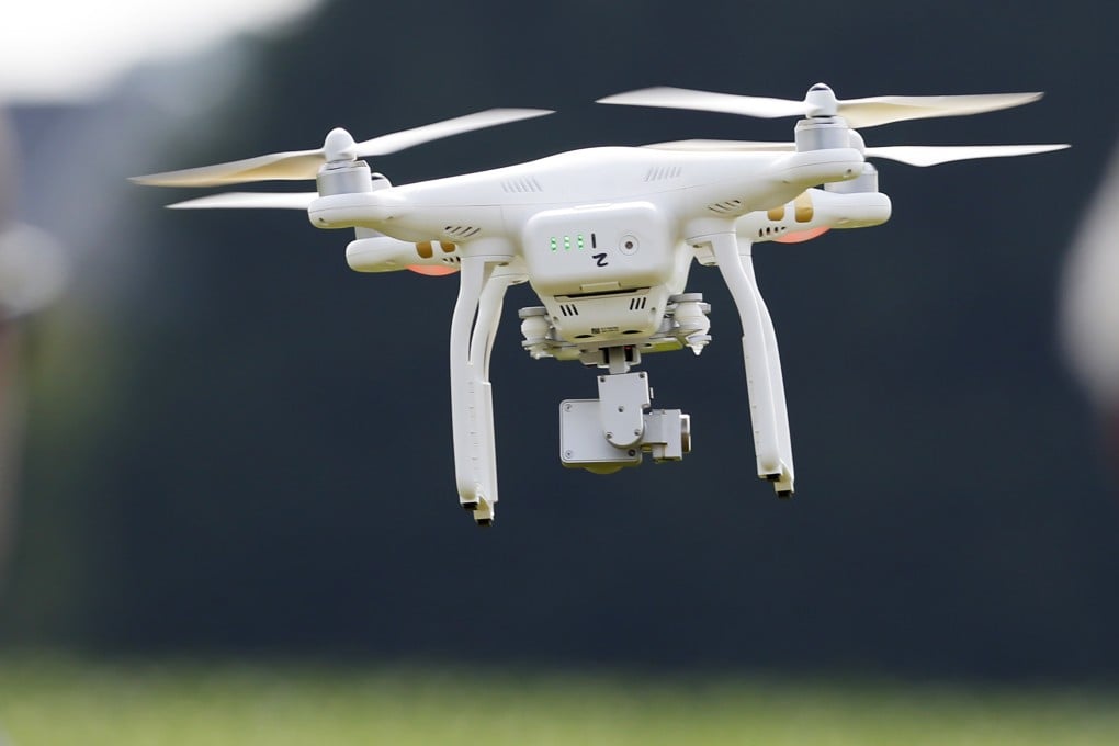 A DJI Phantom 3 drone flies during a demonstration at a farm and winery in the US state of Maryland in 2015. New restrictions on the drone trade could curb the number of Chinese drones entering the United States. Photo: AP