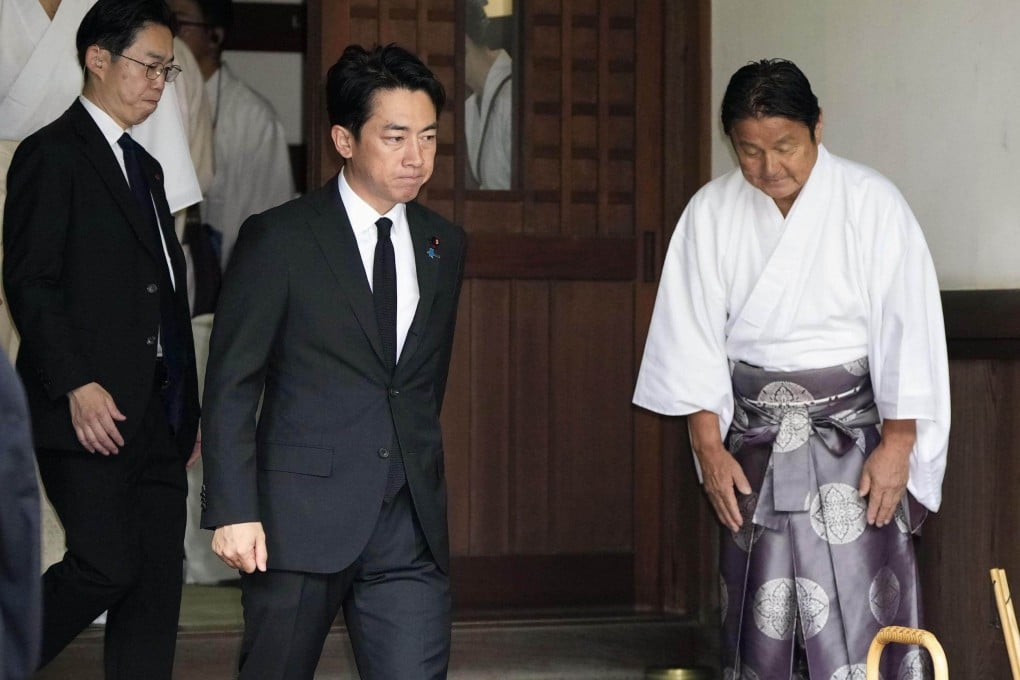 Japanese Defence Minister Shinjiro Koizumi (centre) visits the controversial Yasukuni Shrine in Tokyo on August 15, 2026. Photo: Kyodo