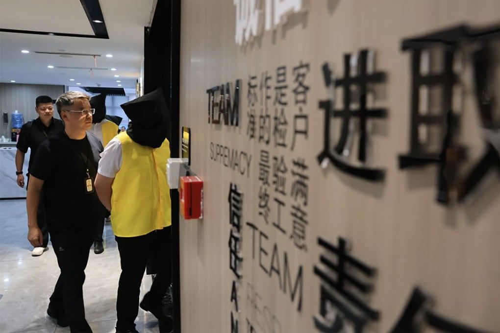 Police in China's eastern Zhejiang province round up a gang involved in perpetrating online loan scams on August 6. Photo: Xinhua