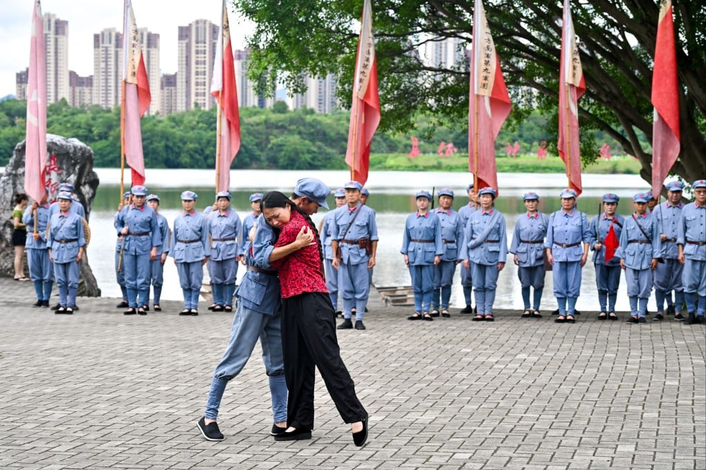 Performers recreate the autumn of 1934, when residents saw off troops setting off on the Long March, in an outdoor performance in Yudu county, Ganzhou city, Jiangxi province, on July 28. Photo: Xinhua