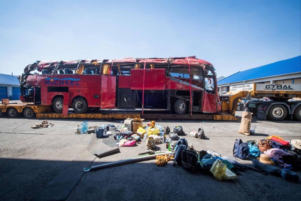 The wreckage of a Polish tourist bus near Miskolc, Hungary following a crash on Sunday. Photo: AFP