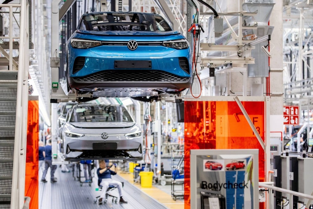 Workers on a Volkswagen electric vehicle assembly line in Germany. Photo: dpa