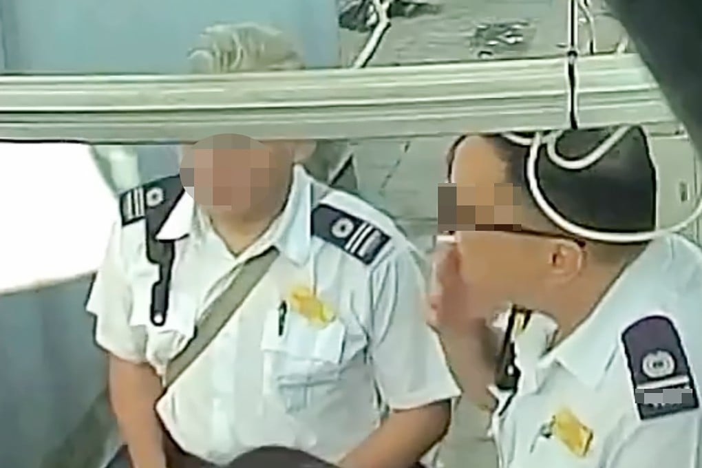 A screengrab from an online clip showing two hygiene officers smoking. Photo: Threads/janicekklove3