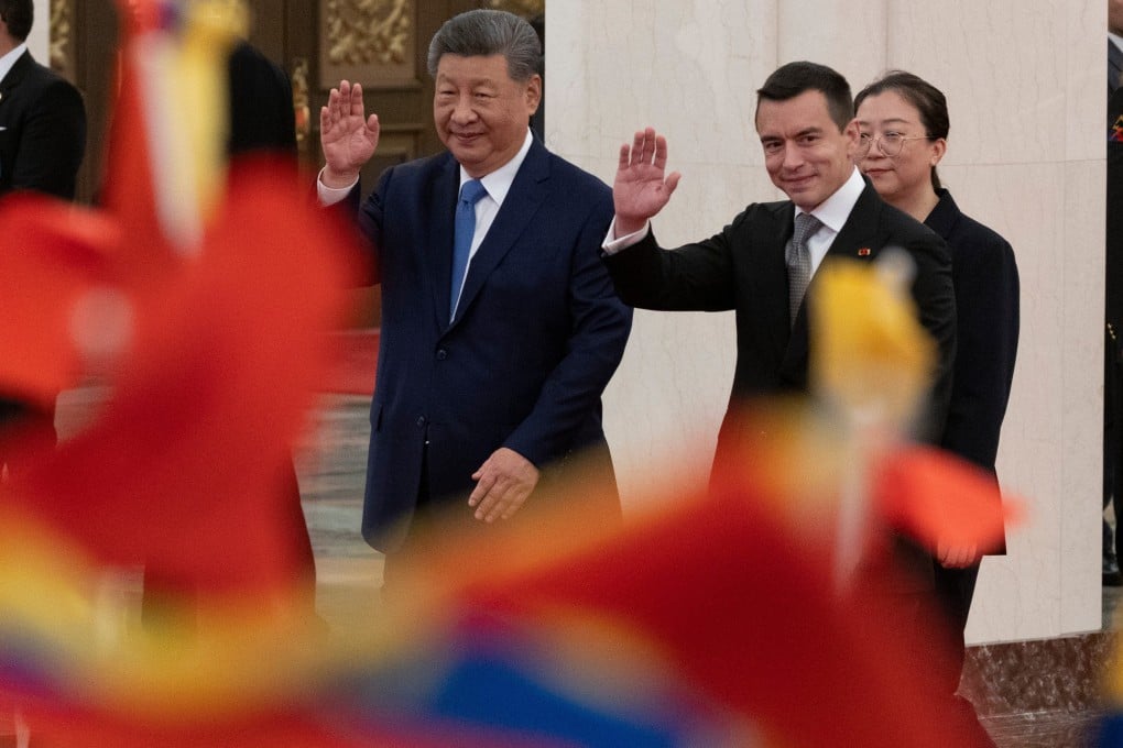 China’s President Xi Jinping and Ecuador’s President Daniel Noboa greet children waving flags at the Great Hall of the People in Beijing. Photo: AP