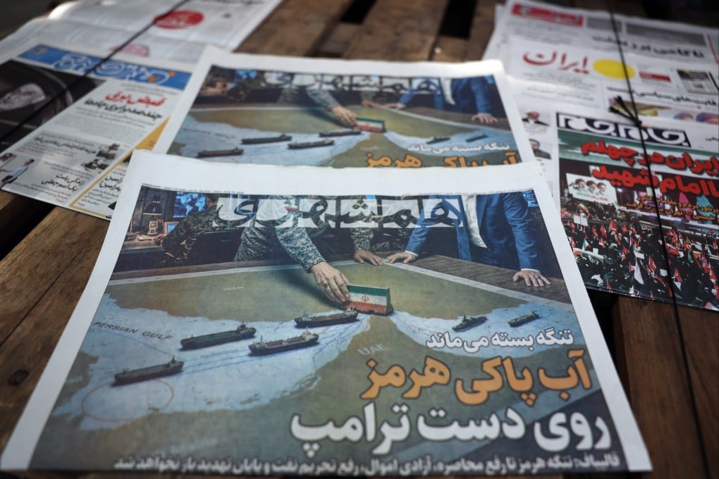 Copies of the Iranian daily newspaper Hamshahri carrying a title that reads in Persian “The Strait of Hormuz remains closed” on display outside a kiosk in Tehran, Iran, on Wednesday. Photo: EPA