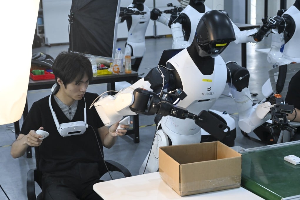 An employee programmes a robot to sort items at Maniformer, a physical AI data service platform, in Shanghai on August 5. Photo: Xinhua