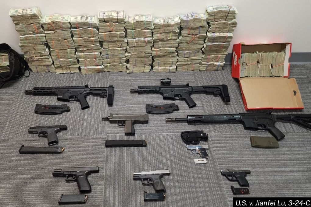 Cash and firearms seized from a criminal organisation that used the services provided by the Chinese money laundering operation, according to prosecutors. Photo: US Department of Justice