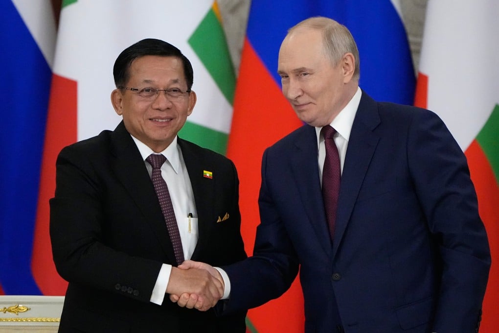 Russian President Vladimir Putin and Myanmar President Min Aung Hlaing shake hands during their meeting at the Grand Kremlin Palace in Moscow on Tuesday. Photo: EPA