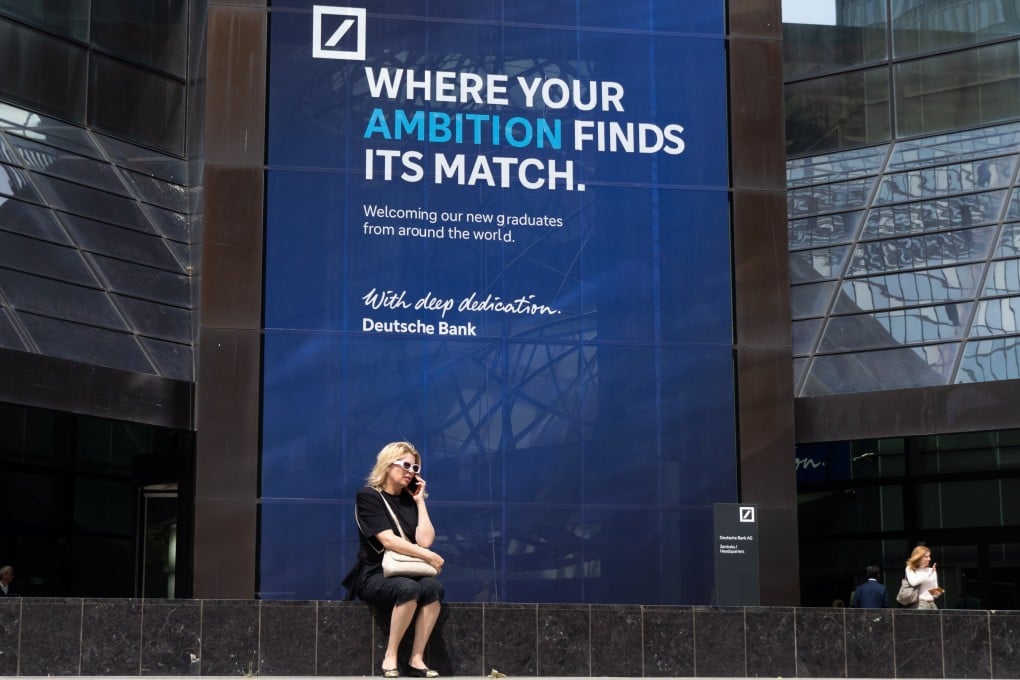 A woman sits in front of the Deutsche Bank central headquarters in Frankfurt on July 22. The People’s Bank of China has authorised Deutsche Bank to serve as a renminbi clearing bank, making it the first European lender to receive such approval. Photo: EPA